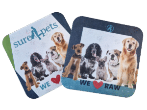 Two branded pub coasters with happy cats and dogs on them, for sure4pets in Barnsley, raw food specialists.